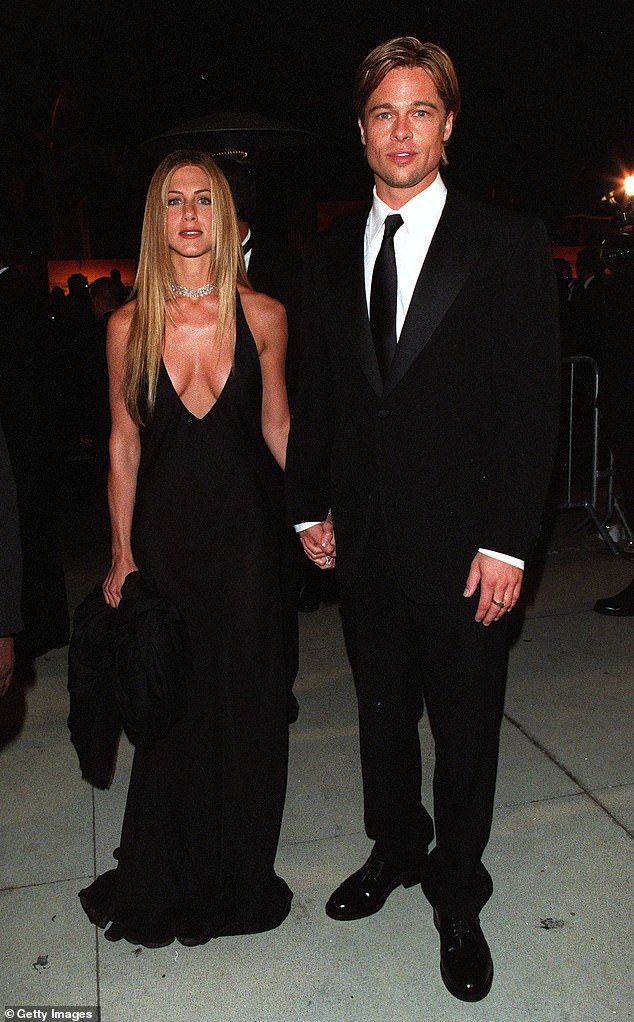 She was also famously married to Hollywood icon Brad Pitt, 61, from 2000 until 2005; They are pictured at the Vanity Fair Party in Los Angeles in 2000