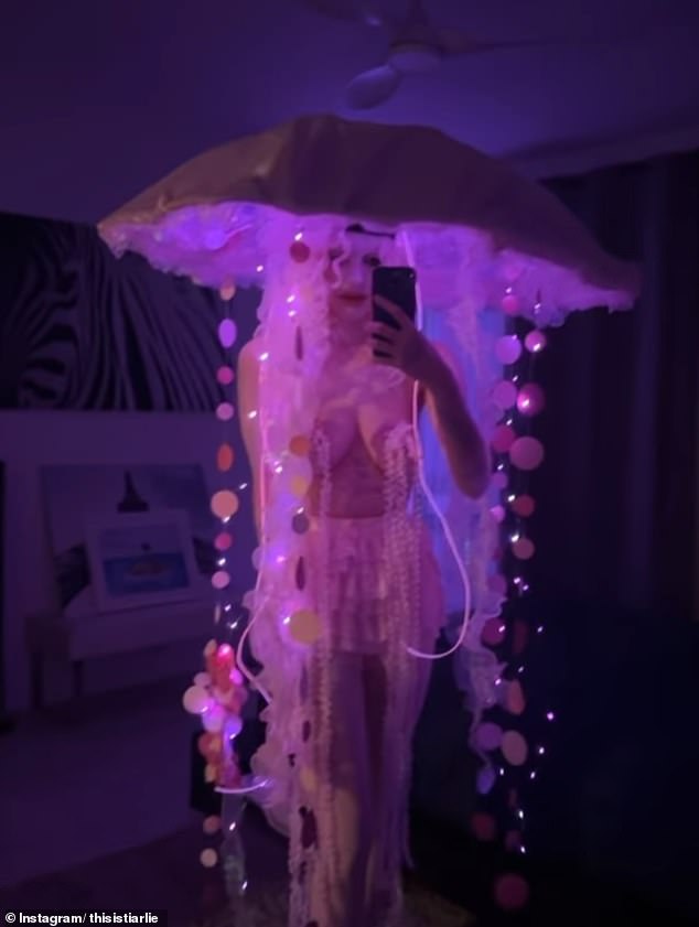 The 'wild child' granddaughter of Rupert Murdoch bared all over the weekend as she went topless in an X-rated jellyfish costume for Halloween