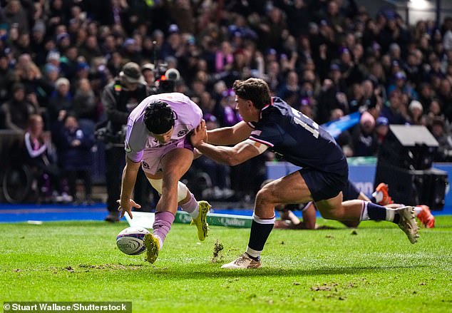 Darcy Graham scores a try to put Scotland 21-0 ahead in their one-sided Test against the USA