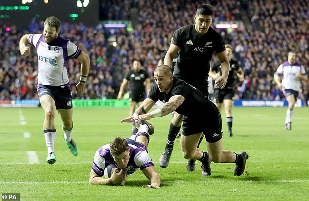 Huw Jones crosses for a try in 2017 as Scotland once again ran the Kiwis close