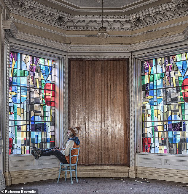 The photographer says she has experienced a 'few' paranormal encounters during her 15 years exploring abandoned properties