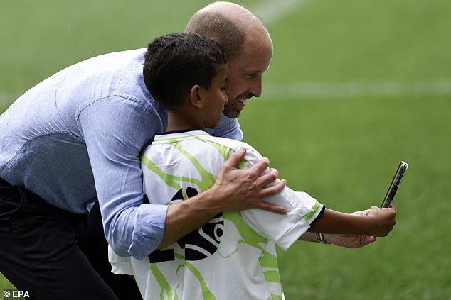Britain's Prince William, the Prince of Wales poses for a photo during an event with young people and community leaders at Maracana Stadium in Rio de Janeiro, Brazil