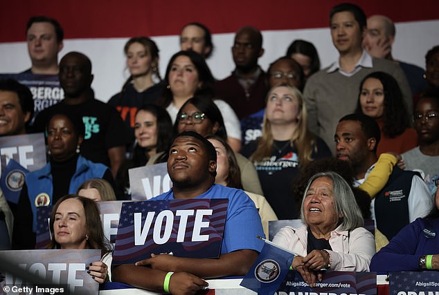 People listen as Virginia Democratic gubernatorial candidate, former Rep. Abigail Spanberger speaks during a campaign rally featuring former U.S. President Barack Obama at Chartway Arena on November 01, 2025 in Norfolk, Virginia. Spanberger will face off against Republican candidate Winsome Earle-Sears in the Commonwealth of Virginia's off-year election for governor and other statewide offices on November 4