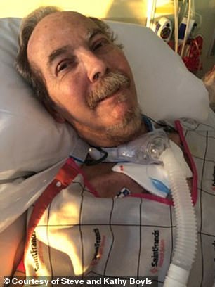 Steve is pictured in the hospital soon after waking up from a coma
