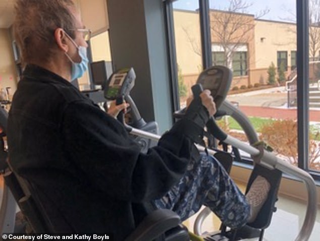 Steve is pictured in rehab, where he had to learn how to walk, talk and sit up after surviving COVID
