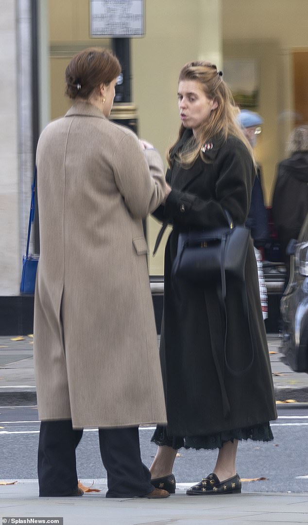 The siblings stood and chatted intensely for a long period in central London on Thursday
