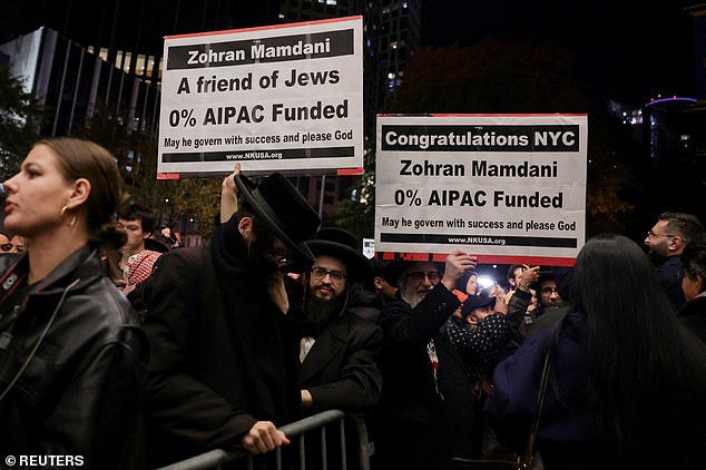 Some of Mamdani's Jewish supporters are seen holding signs outside an election watch party