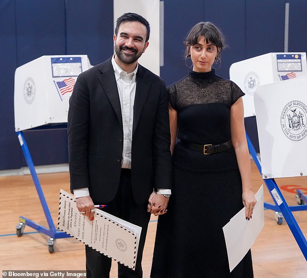Zohran Mamdani and wife Rama Duwaji are seen voting at Frank Sinatra School of the Arts