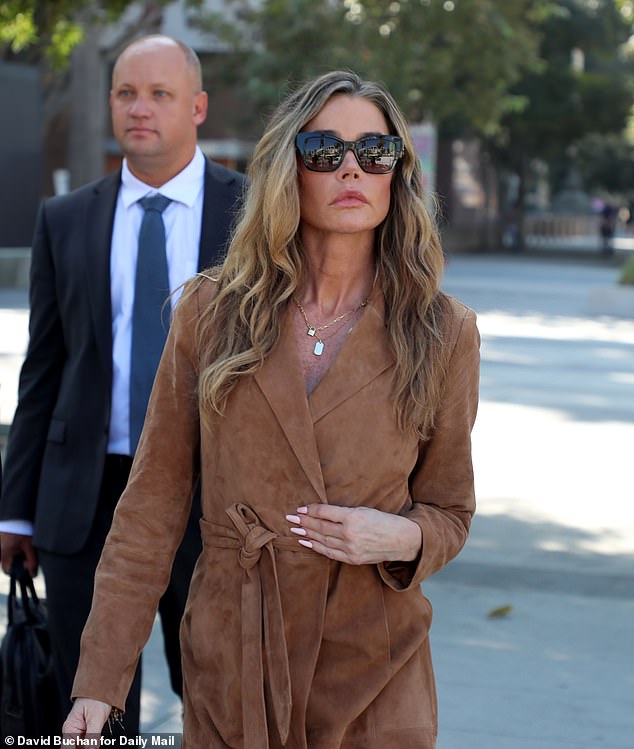 The court hearing was a continuance of the hearing held on October 17 for Richards's temporary restraining order