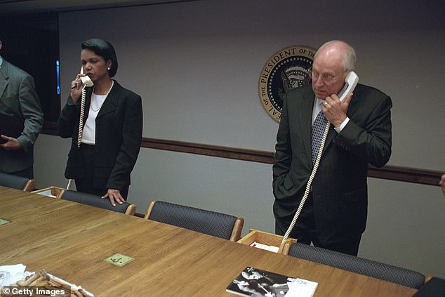 Cheney, seen alongside National Security Advisor Condoleezza Rice, photographed in the Situation Room on the morning of 9/11