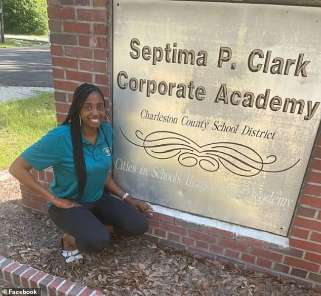 Nelson back in August 2022, in front of the Charleston County School District plaque. She has worked for Charleston County School District since 2012 and has worked at St John's High School for the past three years