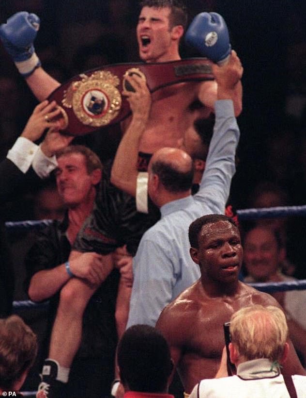 Enzo Calzaghe (left) lifts his son in the air after his defeat of Eubank Snr in 1997
