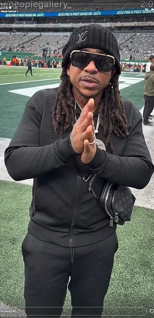 The artist was seen on the sidelines prior to the game