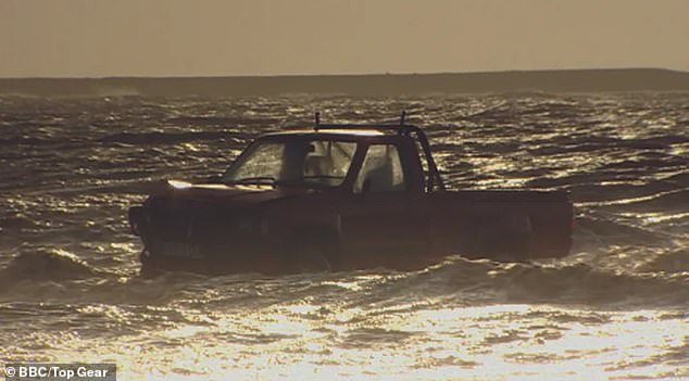 Clarkson and co left the Hilux in the sea in Bristol (pictured), clobbered it with a wrecking ball and even dropped a caravan on top of it from a height