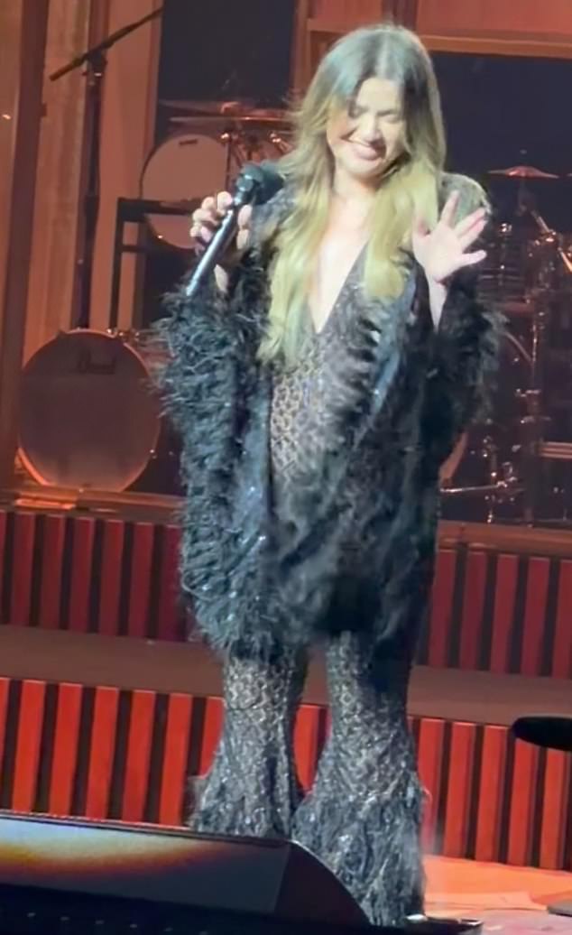 The tale began when the talk show host casually brought up mid show that she wondered if her 'boobs' slipped out of her low-cut black catsuit that had pirates sleeves and feathers