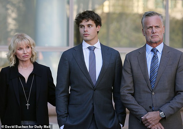 Bohm standing with his father Chris and mother Brooke outside the courthouse after a judge told the court that there was 'sufficient evidence' to warrant the murder charges and that there was 'no doubt' he was driving around 100mph