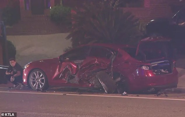 Footage obtained by KTLA from the night of the crash show the mangled remains of his red BMW which he received as an 18th birthday present as part of his wealthy parents' divorce settlement