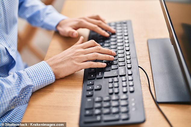 Researchers predict that the keyboard will be obsolete by 2028 as workers adopt voice tools such as AI-powered dictation apps for the majority of their tasks (stock image)