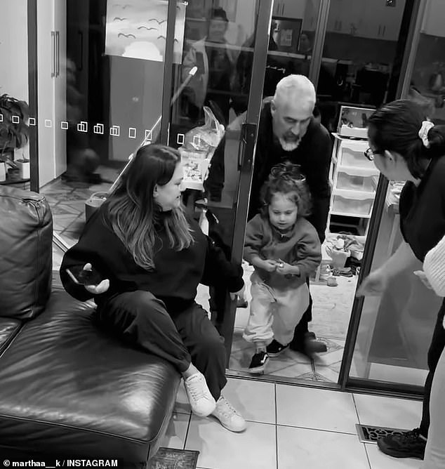 The black and white clip showed Martha's uncle Enzo, who had been given the important information in an envelope, guiding little Lucius back to mum and dad to deliver the news