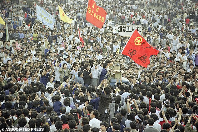 Piker was astounded at the loyalty displayed by Chinese people who had traveled to view the square (pictured during a pro-democracy rally in May, 1989, ahead of the June tragedy)