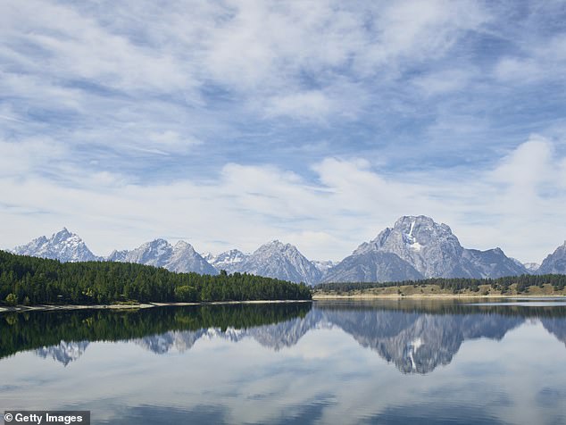 The Grand Teton is the highest mountain of the Teton Range in Wyoming, with a peak that reaches 13,775 feet
