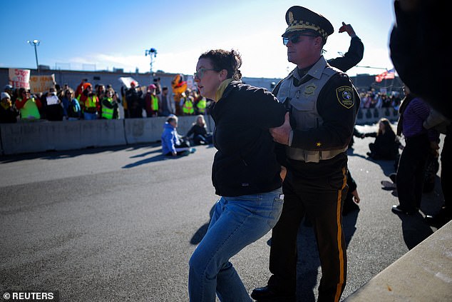 The president declared victory in Chicago after a weeks-long effort to purge the city of illegal immigrants and stamp out crime amid mass protests (pictured)
