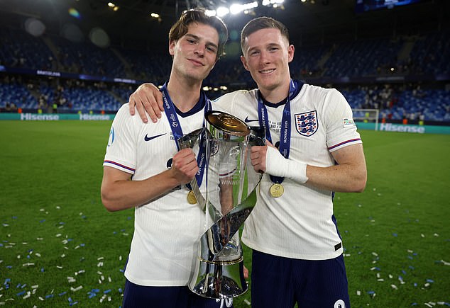 Scott pictured with Nottingham Forest's Elliot Anderson after England's U21 Euro 2025 triumph