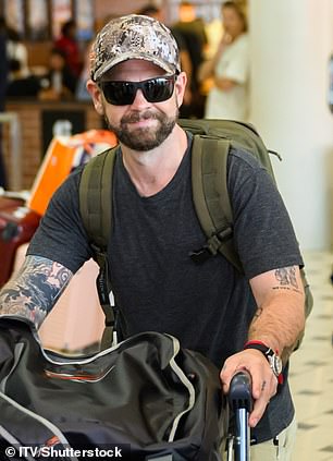 He appeared to be in a buoyant mood ahead of his appearance in the Australian jungle