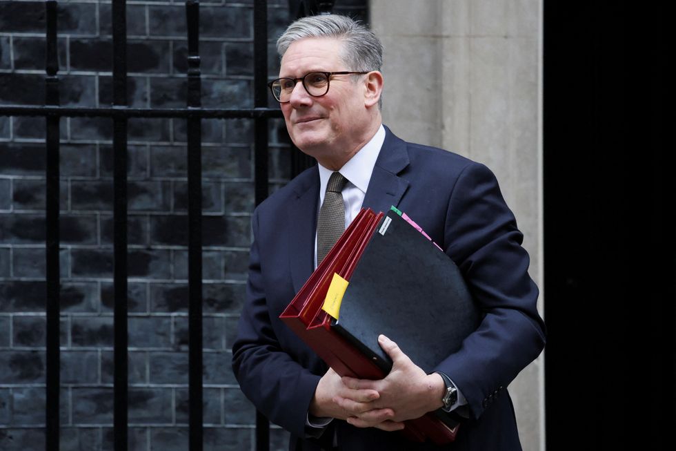 \u200bBritish Prime Minister Keir Starmer walks outside 10 Downing Street