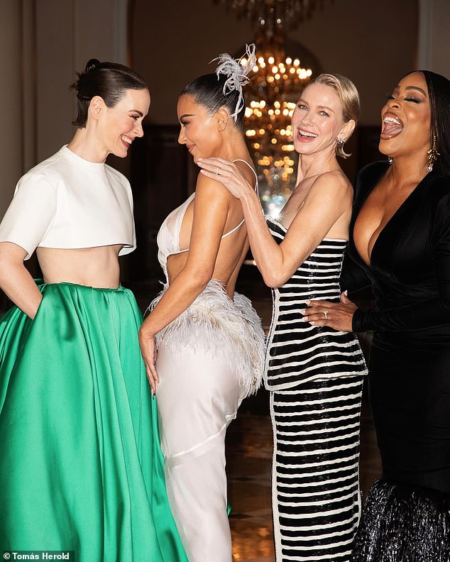While Kim also shared several snaps of her cosying up to her new girl gang and castmates - Sarah Paulson, Naomi Watts, and Niecy Nash-Betts (L-R)
