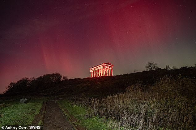 The Northern Lights were also visible at the Penshaw Monument in Sunderland with vibrant hues of pink, green and purple lighting up the skies