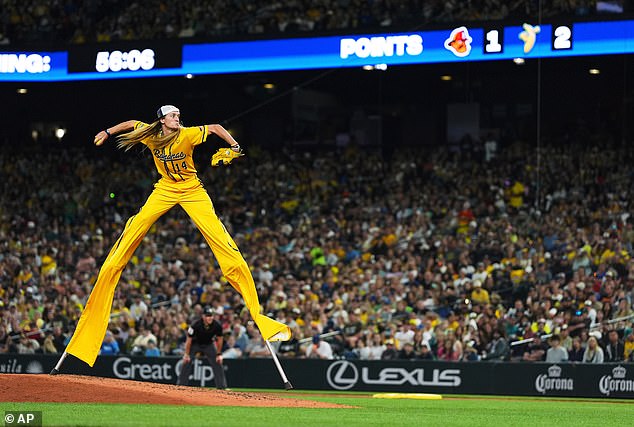 Dakota 'Stilts' Albritton pitches against the Firefighters on the 2025 'Banana Ball World Tour'