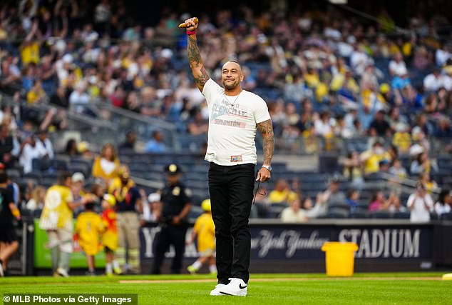 WWE wrestler Damian Priest threw the first pitch at Yankee Stadium using a golden banana
