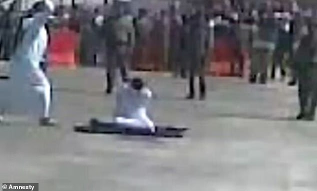 Saudi Arabia is among the worst countries in the world for executions, only sitting behind China and Iran (A man kneels moments before being beheaded in Saudi Arabia)