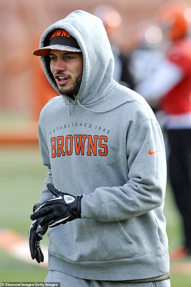 McDaniel is pictured in 2014 as a Brown assistant - two years before he would get sober