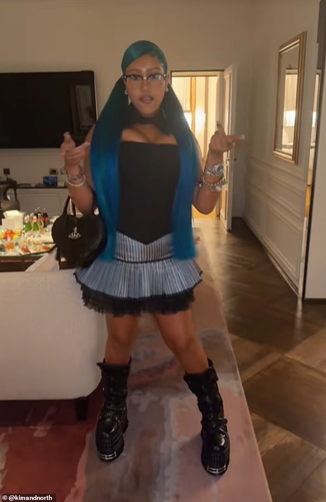 In screenshots, captured by The Sun , one of her fingers featured a pair of silver gems, while another displayed a blue stone in the center of her middle finger