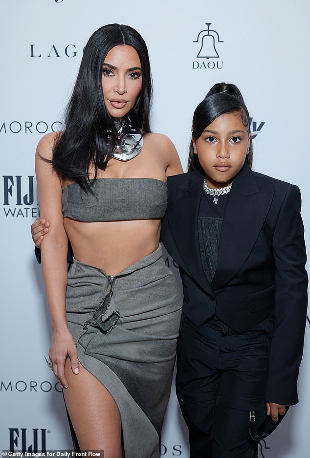 Last month, the reality star, 44, came under fire over the summer for letting North West wear a corset during an outing in Rome (pictured in 2023)