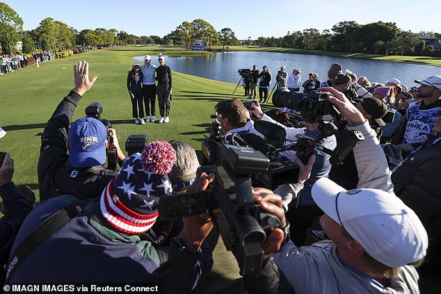 Hoards of media members and tournament organizers swarmed the first tee box