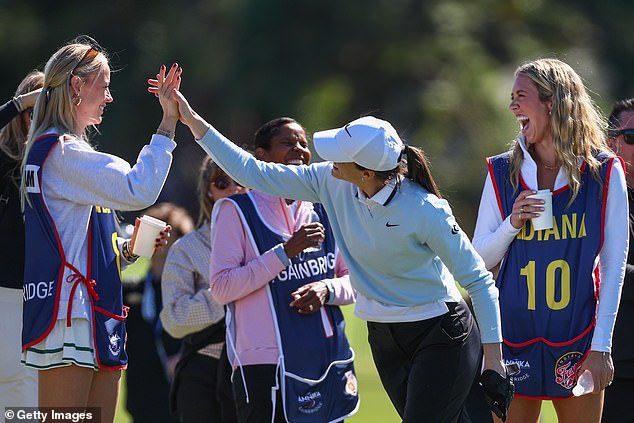 Clark celebrated with her Indiana Fever teammate Cunningham during the round