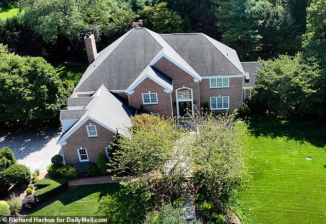 Sun and her husband Chris Hu allegedly purchased a $3.6 million mansion in Manhasset, Long Island (pictured) in 2021 using cash funneled from the Chinese Communist Party