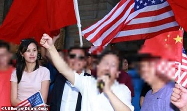 Sun (left) is seen at a 2019 protest against the Taiwanese president's visit in New York City,  federal prosecutors said