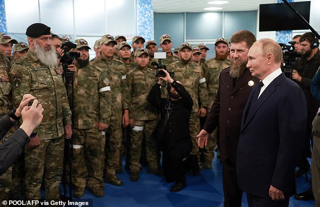 Kadyrov and his troops with Russian president Vladimir Putin