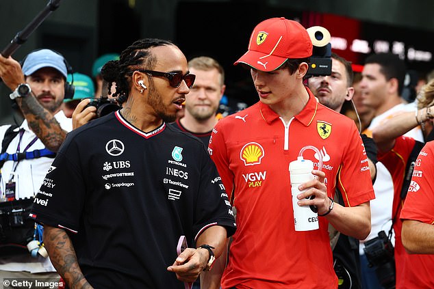 Schumacher believes Bearman can do what Hamilton does at a 'fraction' of the cost (the current F1 duo are pictured last year sharing an exchange)