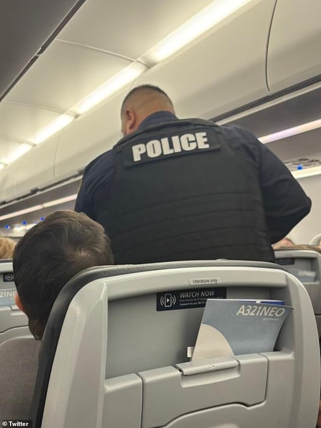 The incident caused the flight from Phoenix Sky Harbor International Airport to make an emergency stop in Kansas City after the unruly flier caused a disturbance after takeoff on Wednesday