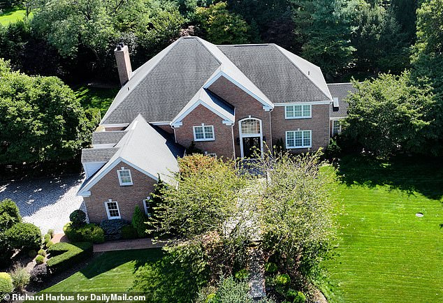 Sun and her husband Chris Hu allegedly purchased a $3.6 million mansion in Manhasset, Long Island (pictured) in 2021 using cash funneled from the Chinese Communist Party