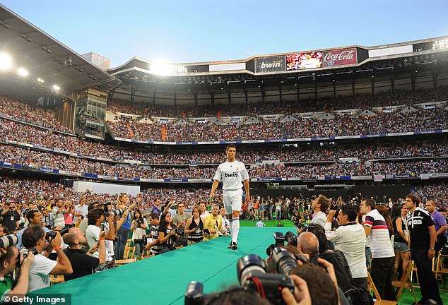 Thomas worked for Real Madrid TV before joining ESPN and hosted Cristiano Ronaldo's presentation in 2009 (pictured) after the Spanish club signed him from Manchester United