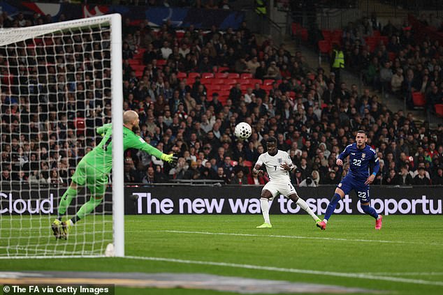 Bellingham watched from the sidelines as Bukayo Saka superbly opened the scoring