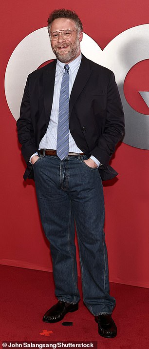 Seth Rogen, 43, looked cool in a striped shirt, jeans and a blazer