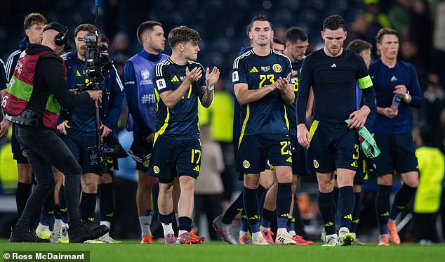 Scotland players applaud the home support at Hampden following the 2-1 victory over Belarus