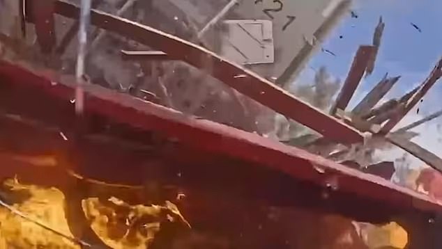 One of the cars burst into a fireball following the impact, which sent debris flying